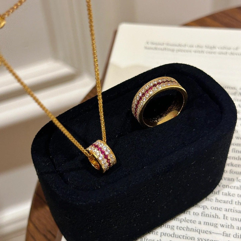 Diamond-set red corundum ring and necklace