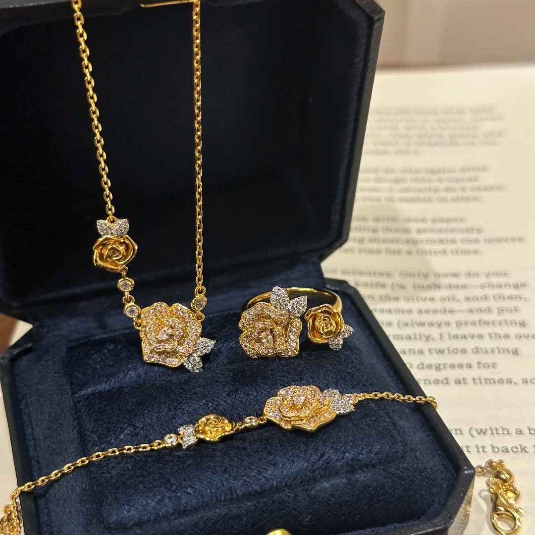 Vintage diamond-encrusted rose necklace, ring and bracelet