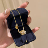 Vintage diamond-encrusted rose necklace, ring and bracelet